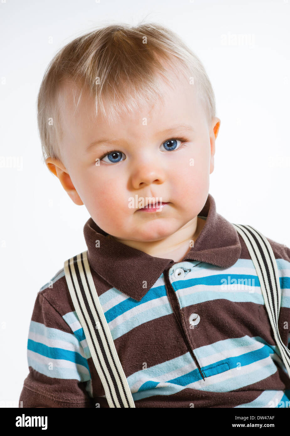 Boy wearing striped shirt hires stock photography and images Alamy