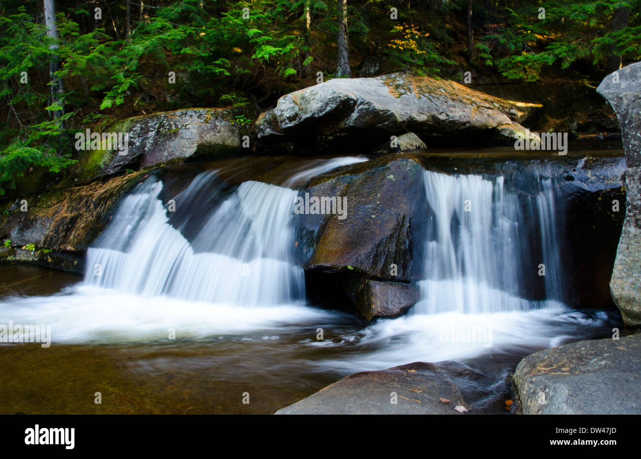 Grafton Notch State Park near Newry Maine waterfalls over rocks in New England in fall  Stock Photo
