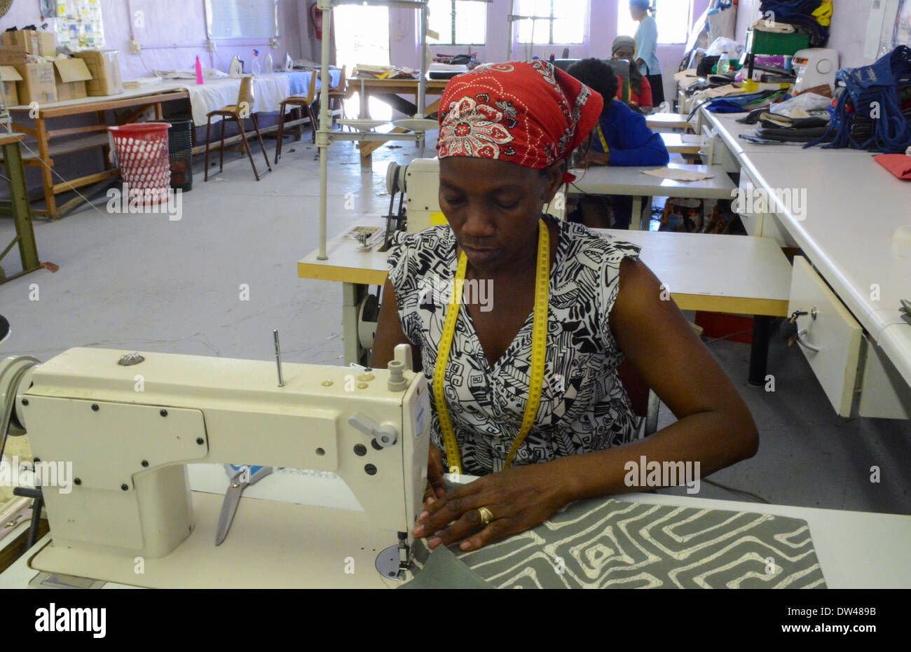 Windhoek Namibia Africa woman sewing fabrics and crafts at Penduka