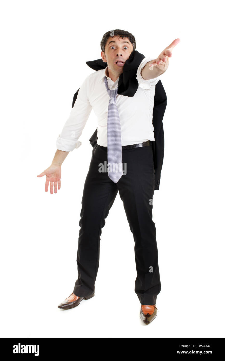 Man down on his luck beseeching and imploring standing with his clothing in disarray and his hand outstretched in supplication Stock Photo