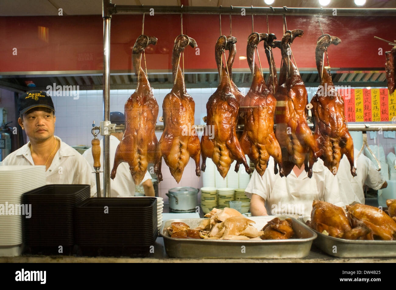 Peking Ducks on Display in Chinatown. Typical Asian food restaurant in