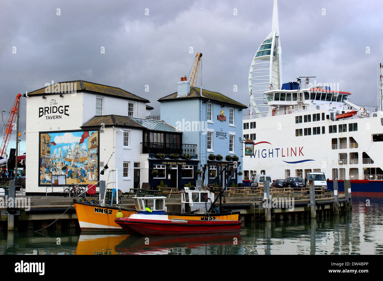 Portsmouth fishing harbour, buildings and ships Stock Photo