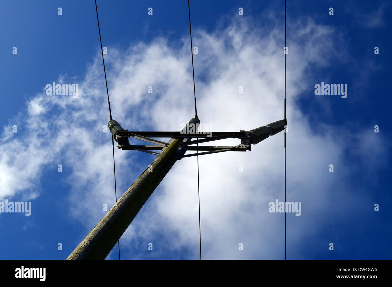 Electricity pole under blue sky. Stock Photo