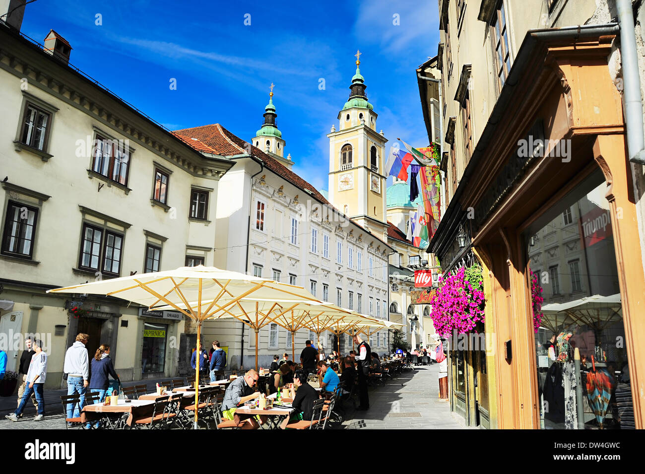 People at street cafe in old town of Ljubljana, Slovenia. Stock Photo
