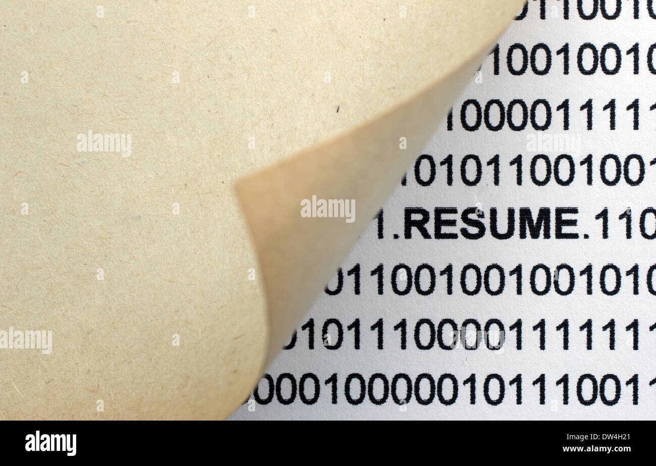 Resume text behind paper Stock Photo