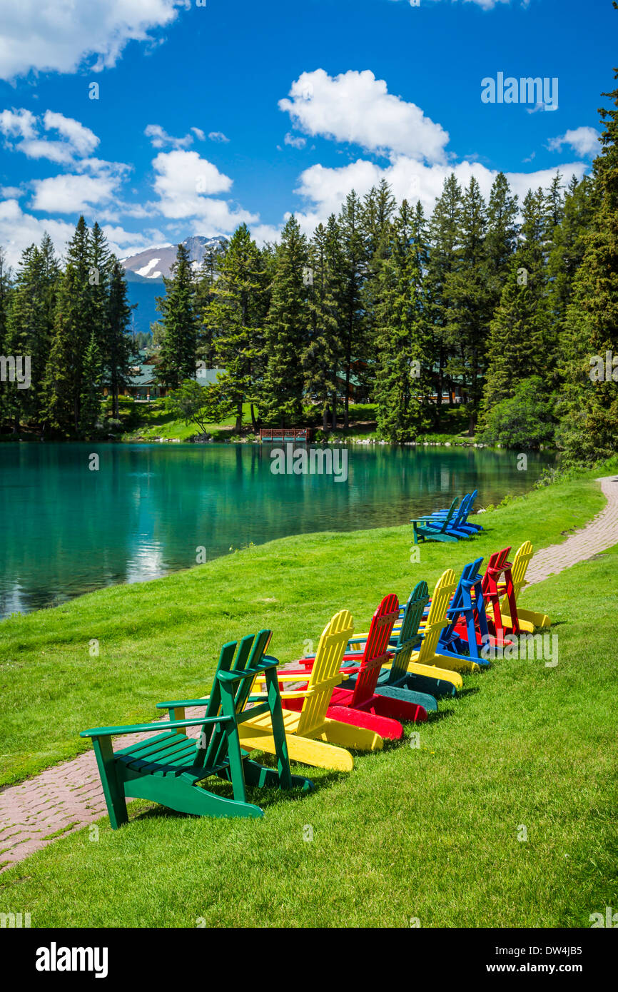 Colorful lawn chairs beside the lake at the Fairmont Jasper Park Lodge