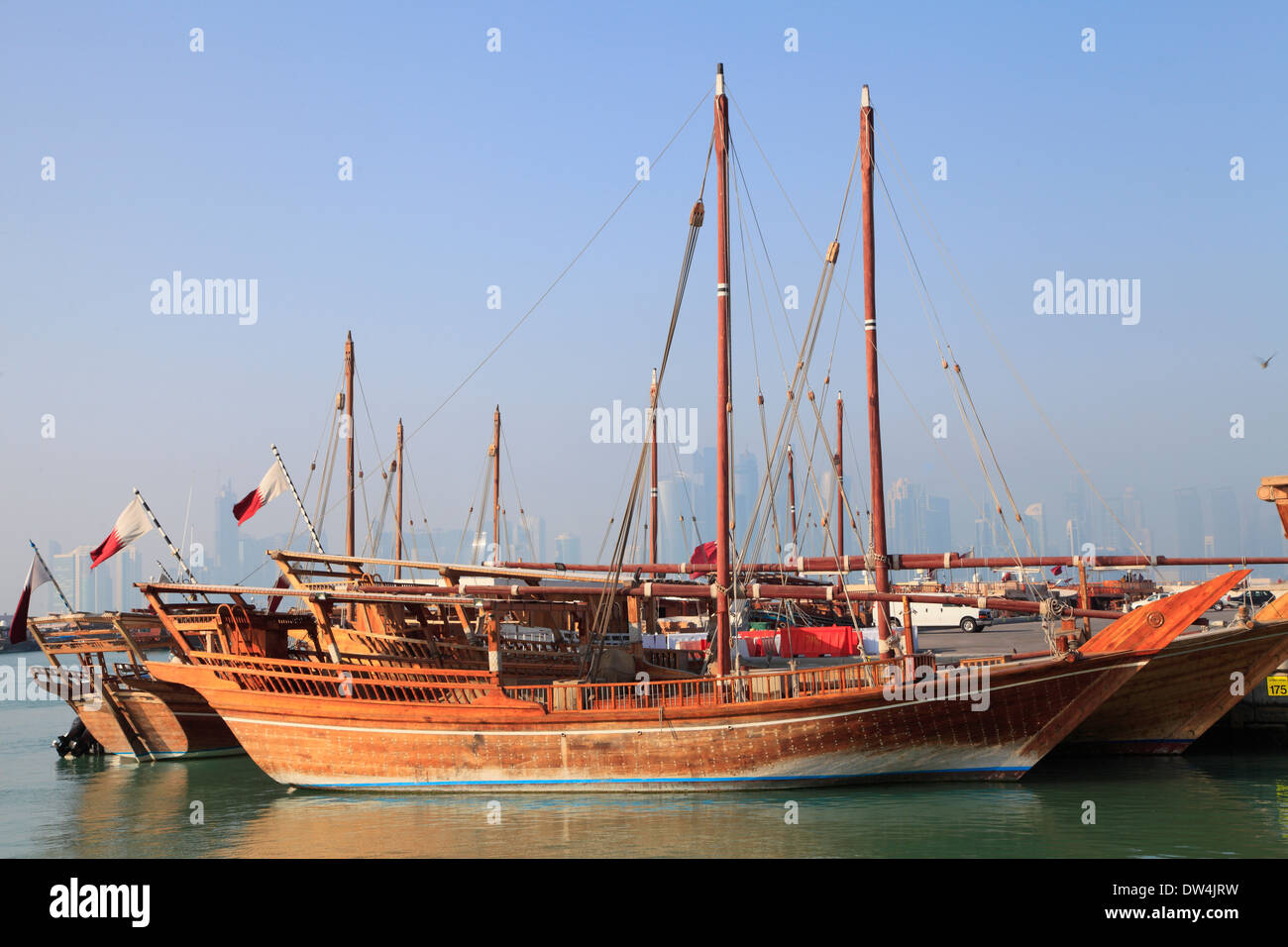 Qatar, Doha, Dhow Harbour, traditional boats, skyline Stock Photo