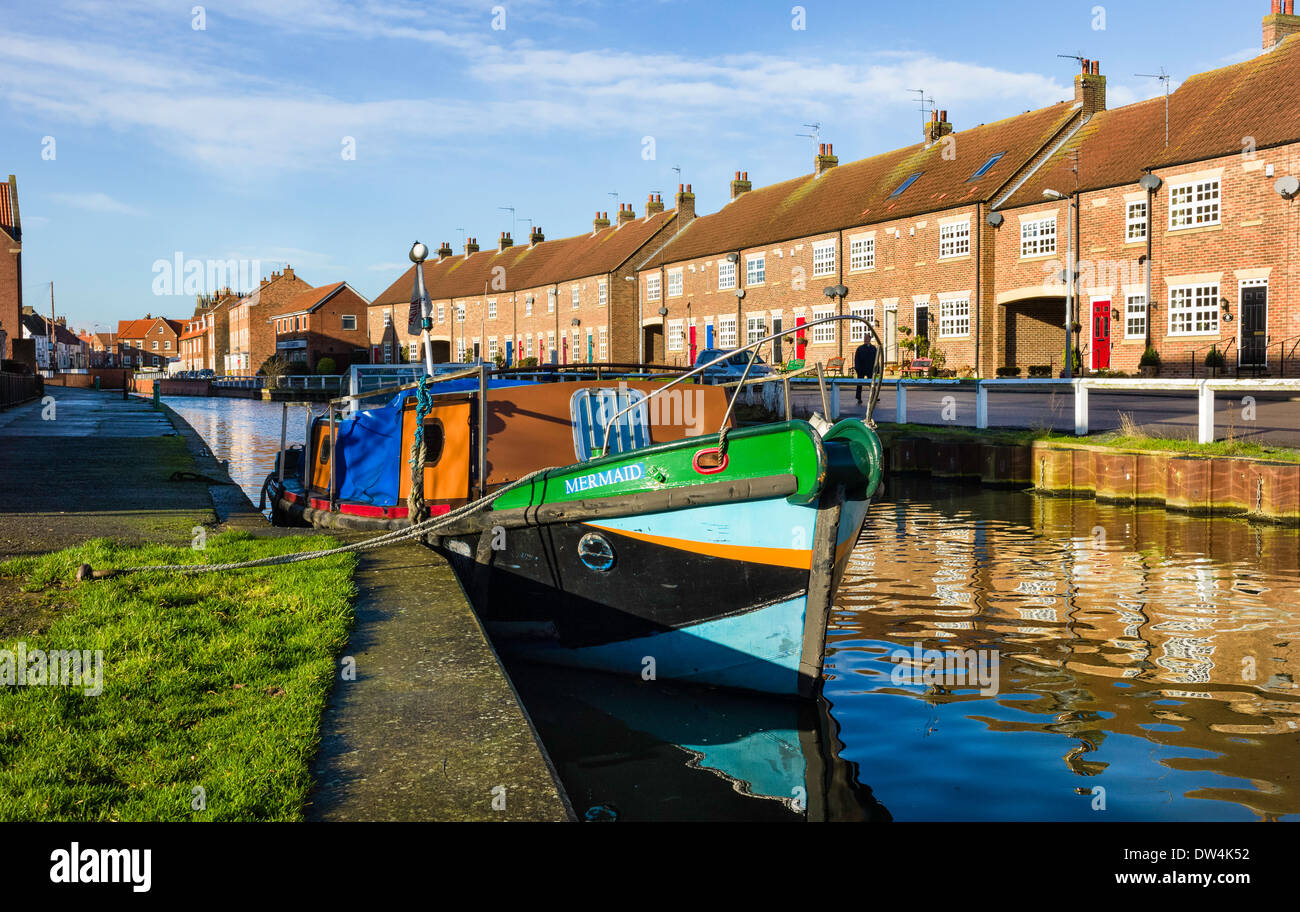 A boat moored along the beck (canal) on a fine winter's morning in Beverley, Yorkshire, UK. Stock Photo