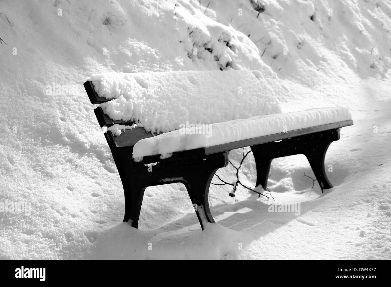 Lonely bench in snow, Swabian Forest, Germany, Mar. 7, 2010. Stock Photo