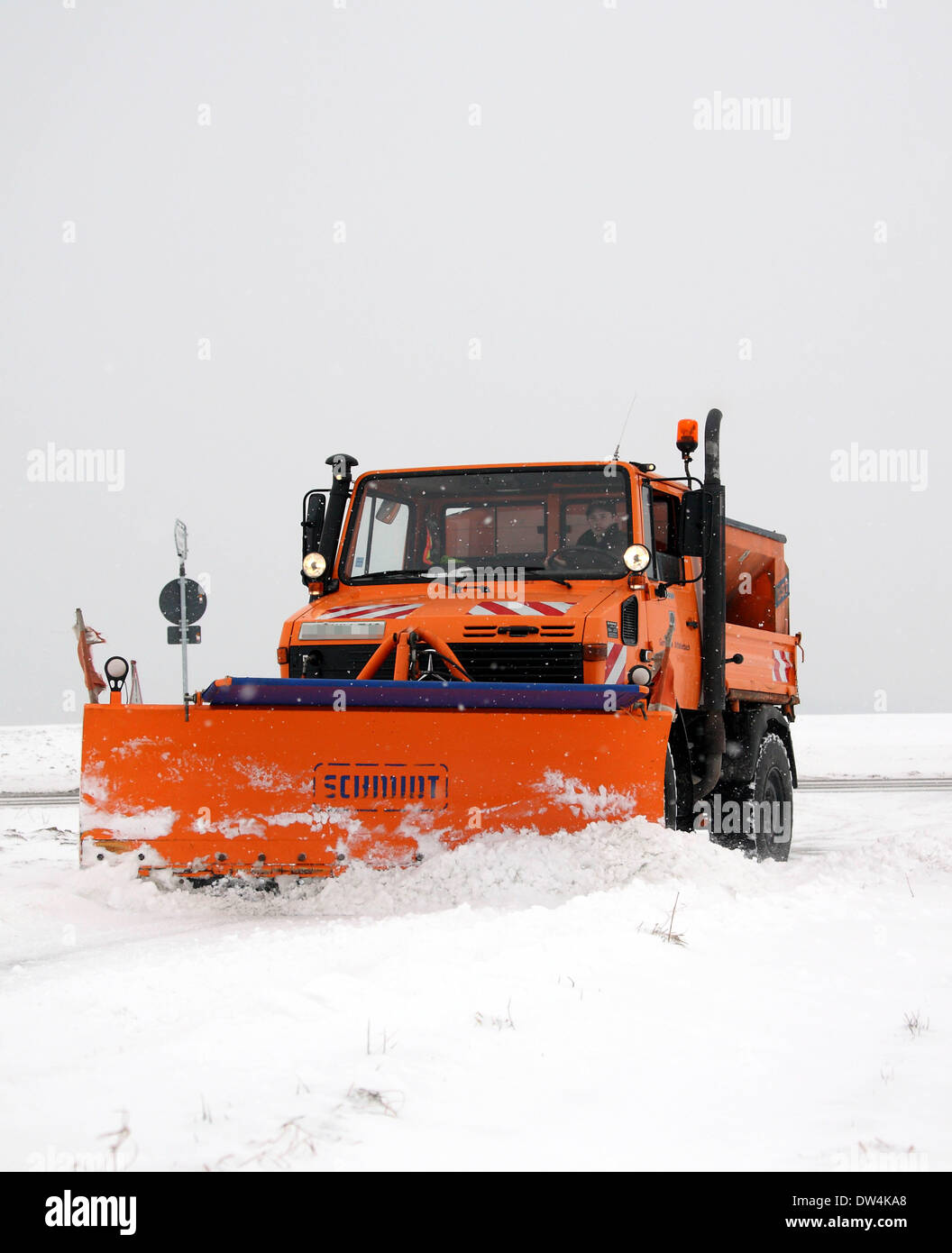 Mercedes Unimog snow plow in action, Affalterbach, Germany, Febr. 01