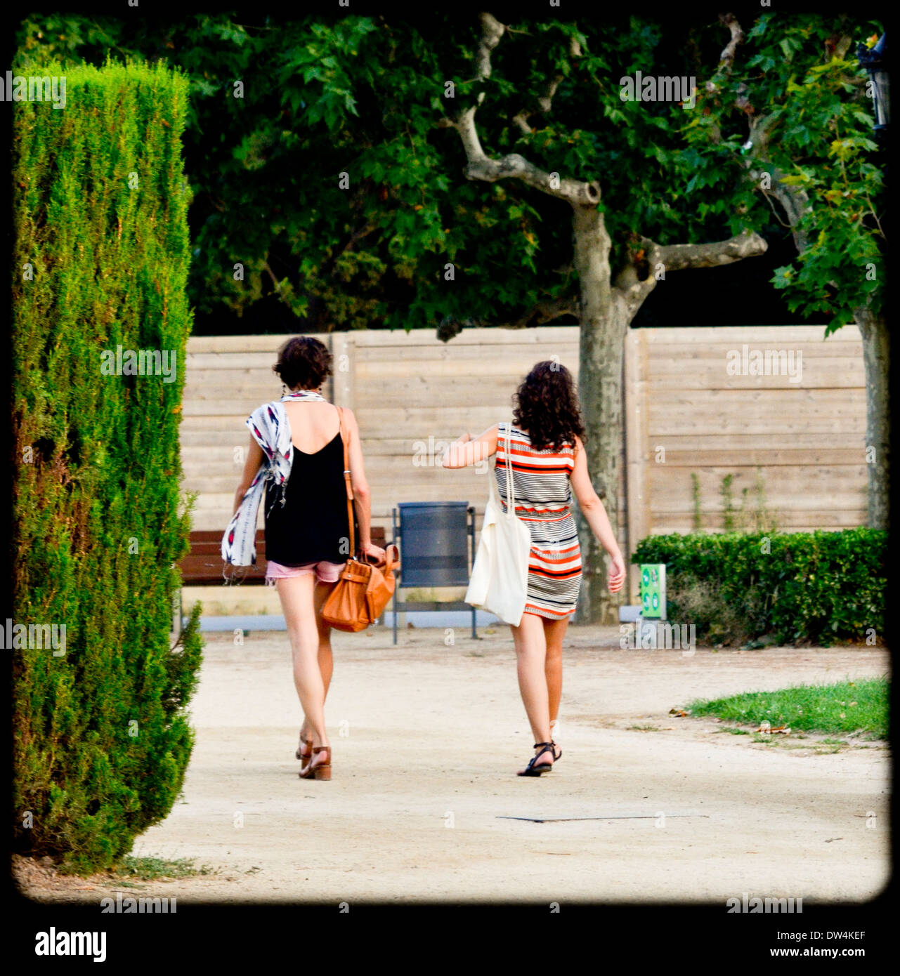 Two young women in park hi-res stock photography and images - Alamy
