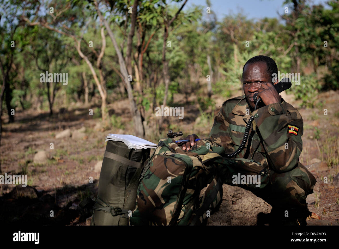 Ugandan soldiers of the Uganda People's Defence Force (UPDF) patrol through the Central African jungle during an operation to hunt notorious Lord's Resistance Army (LRA) leader Joseph Kony. The LRA is a Christian militant rebel group. Stock Photo