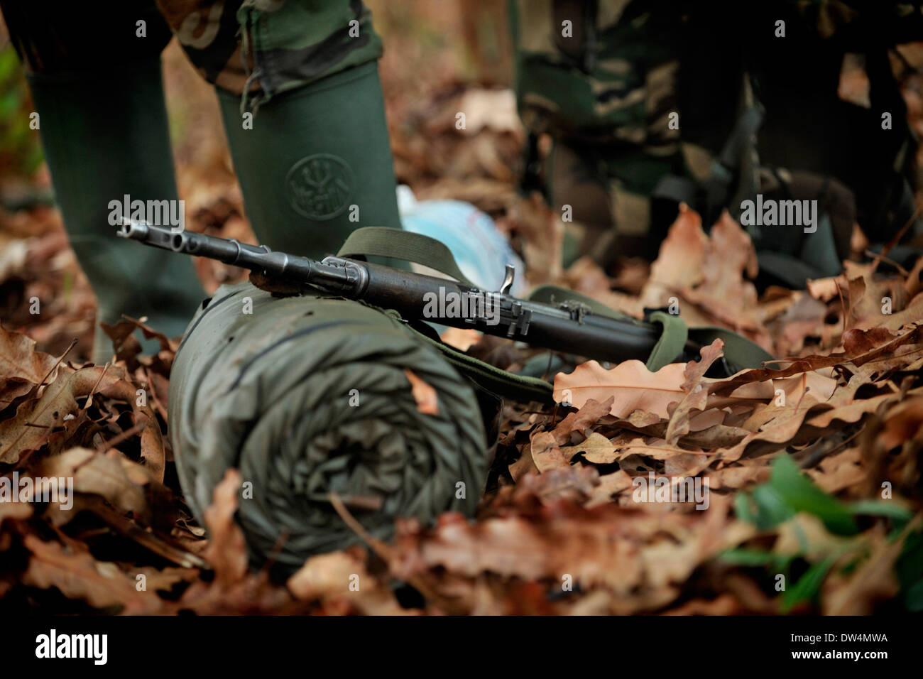 Ugandan soldiers of the Uganda People's Defence Force (UPDF) patrol through the Central African jungle during an operation to hunt notorious Lord's Resistance Army (LRA) leader Joseph Kony. The LRA is a Christian militant rebel group. Stock Photo