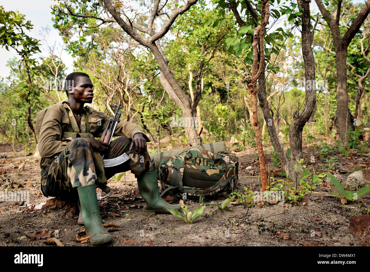 Ugandan soldiers of the Uganda People's Defence Force (UPDF) patrol through the Central African jungle during an operation to hunt notorious Lord's Resistance Army (LRA) leader Joseph Kony. The LRA is a Christian militant rebel group. Stock Photo