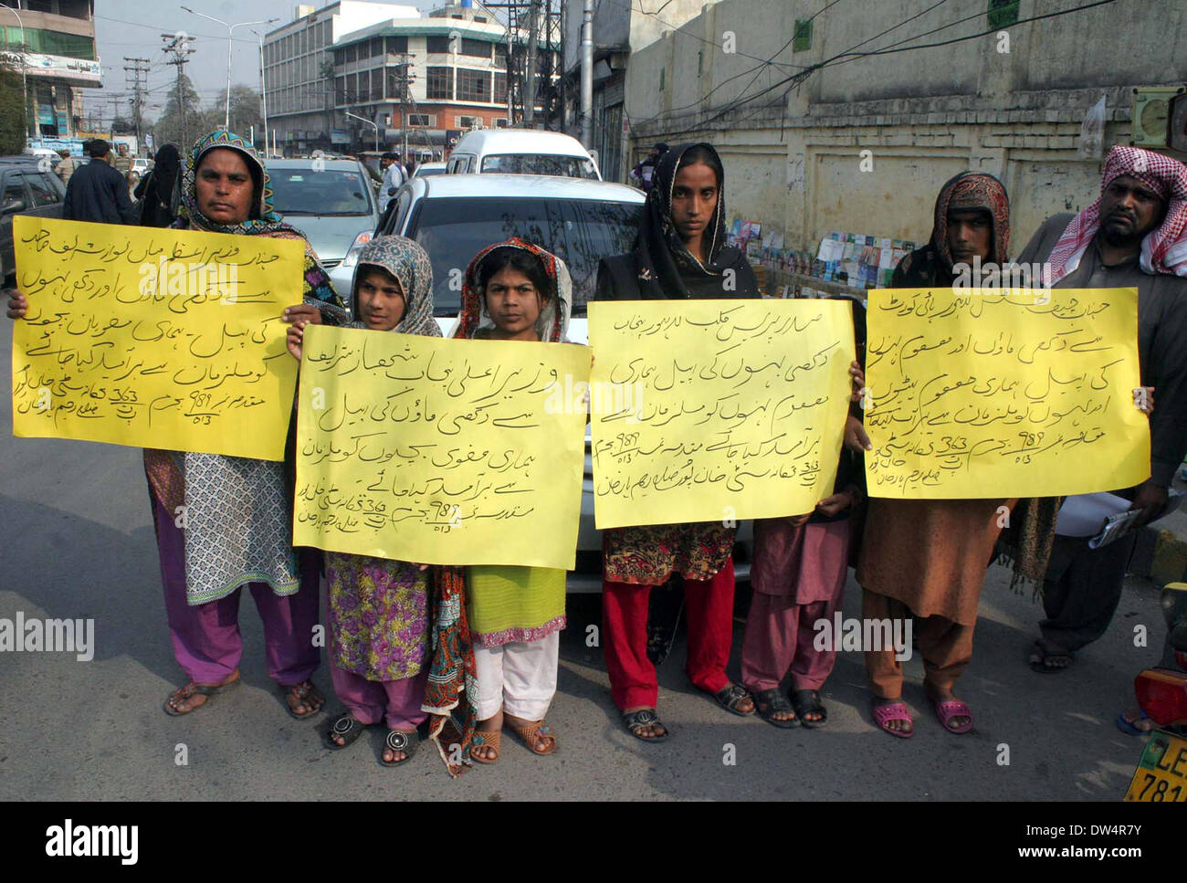 Residents of Khanpur are protesting against kidnapping of their daughters Shahzadi Bibi and Tasleem Bibi, during a demonstration at Lahore press club on Thursday, February 27, 2014. Stock Photo