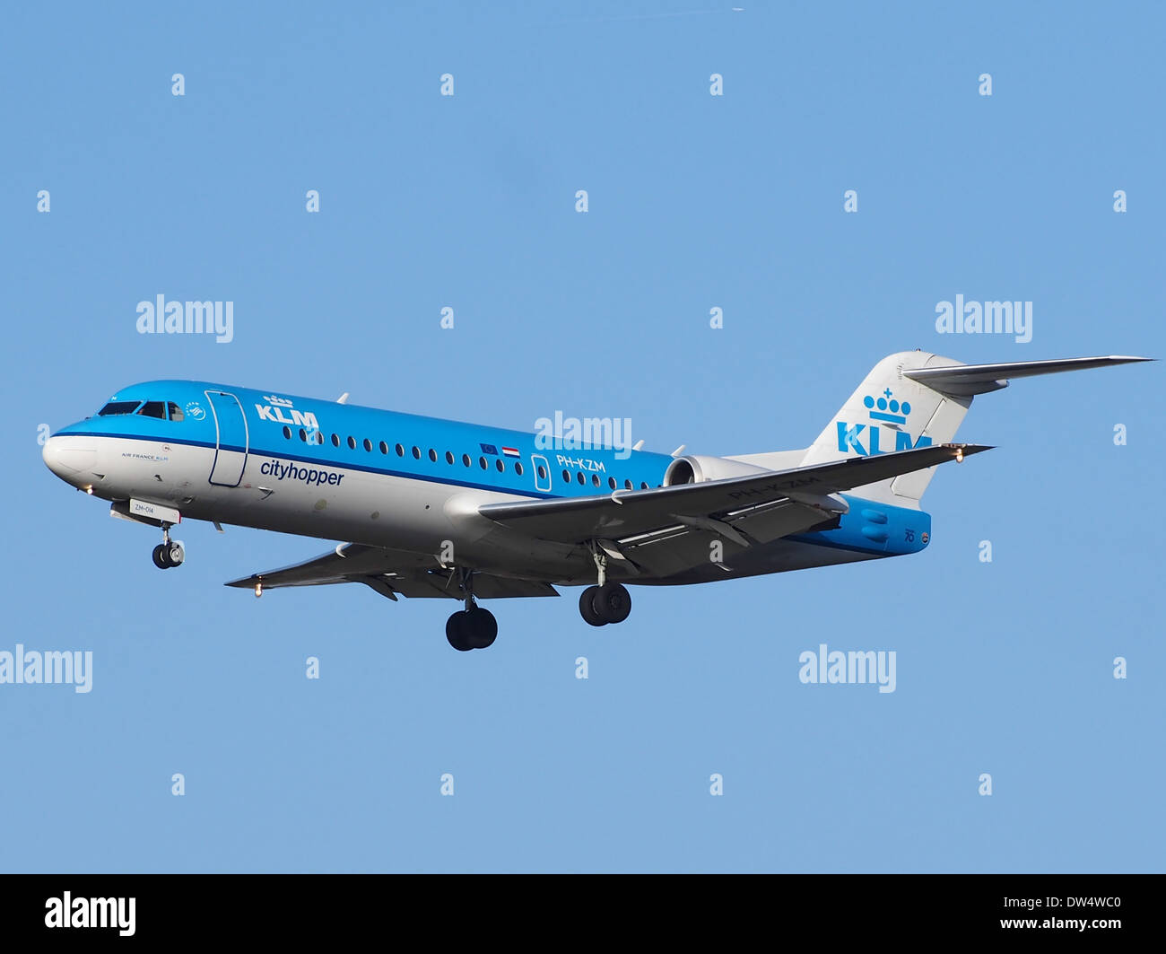 The KLM Cityhopper PH-KZM, a Fokker 70/100 aircraft, is a regional airliner in the KLM fleet. It is used for short-haul flights within Europe, offering efficient travel between destinations. Stock Photo