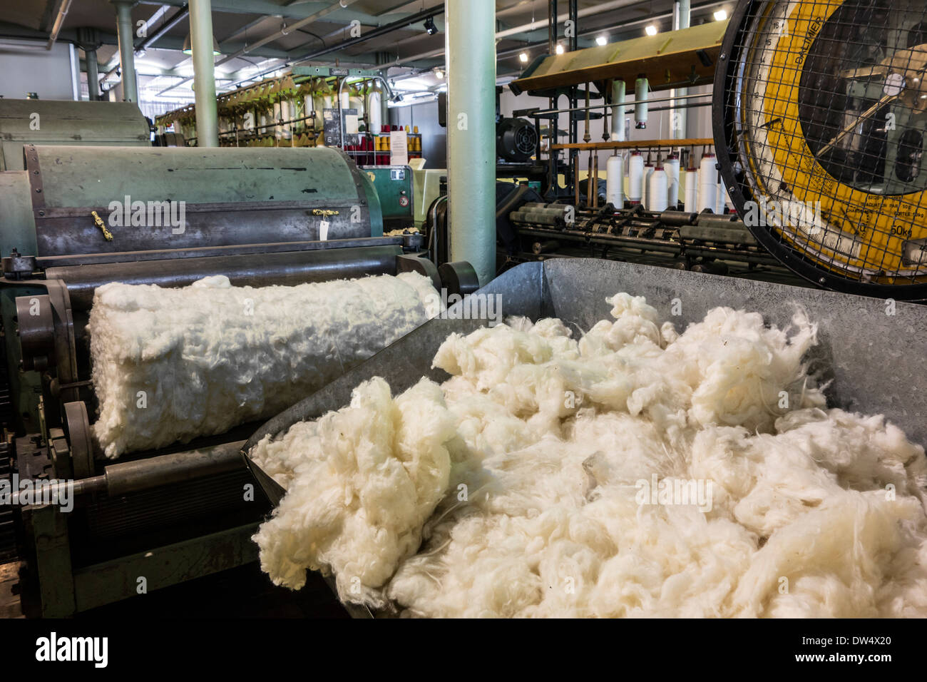Scutching machine and raw cotton in cotton mill at MIAT, industrial archaeology museum, Ghent, Belgium Stock Photo
