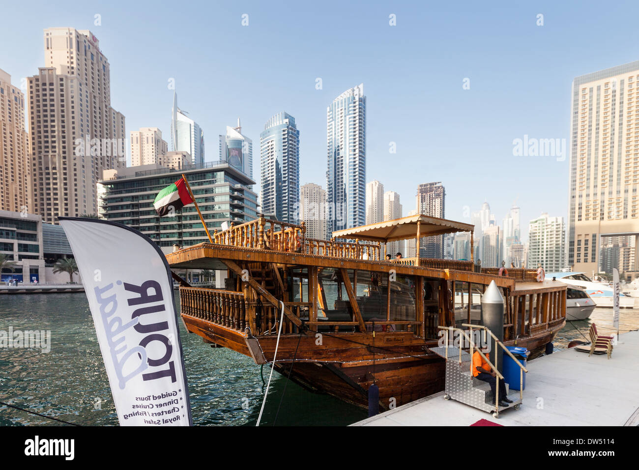 A tourist boat in Dubai Marina, Dubai, United Arab Emirates UAE Middle east Stock Photo
