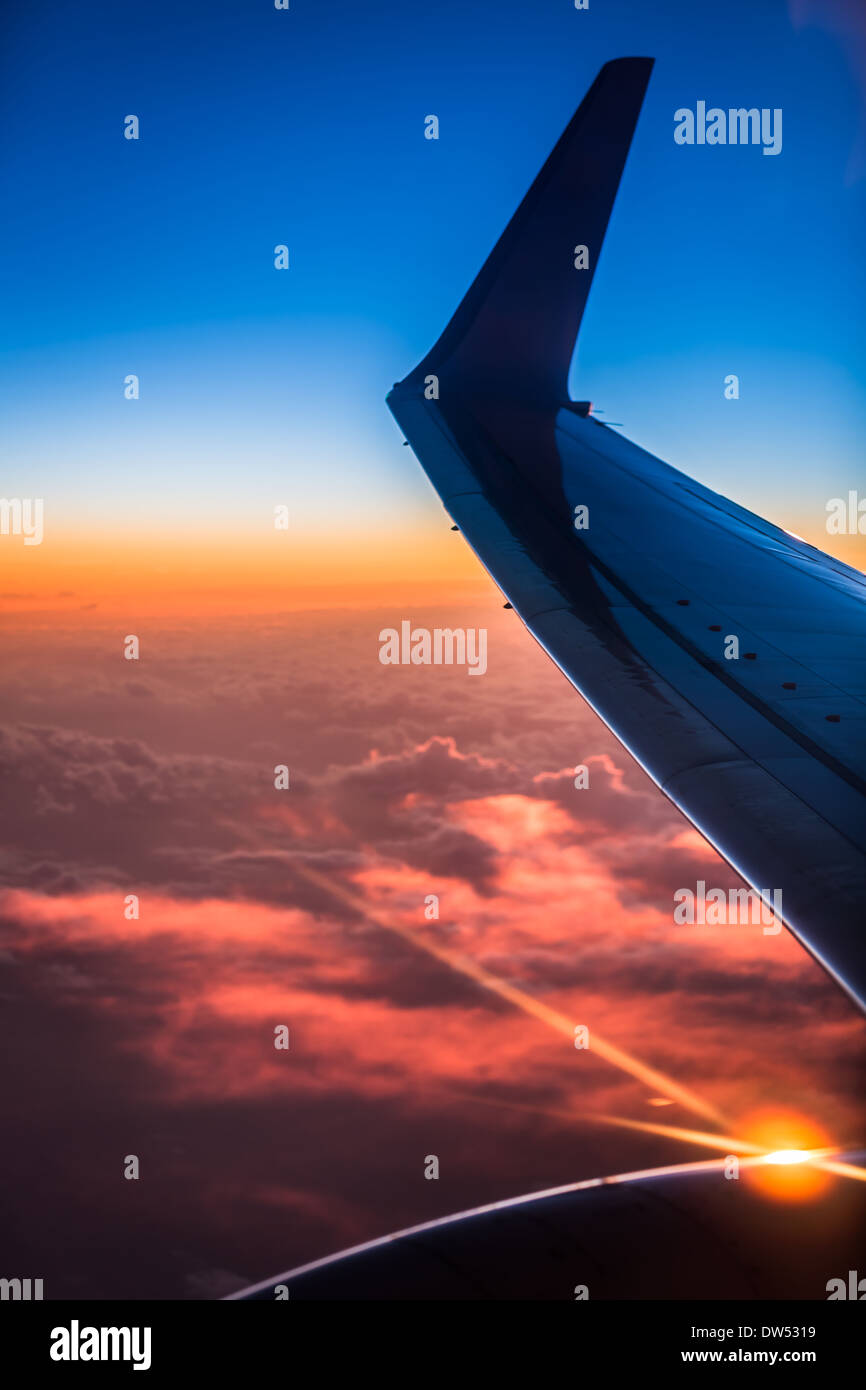 Sunset view from the airplane window Stock Photo