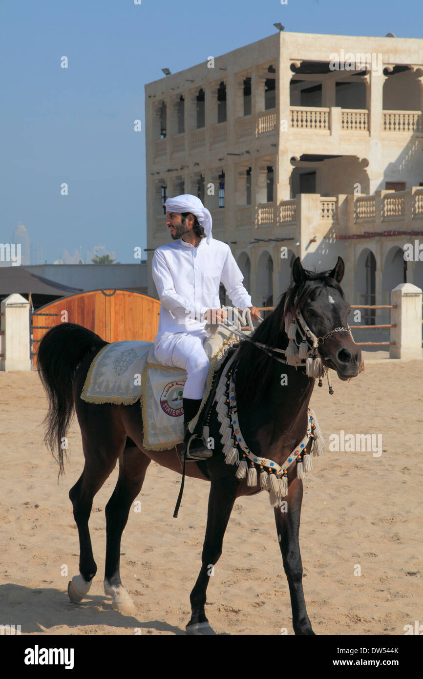 Qatar, Doha, Souq Waqif, horseback rider Stock Photo Alamy