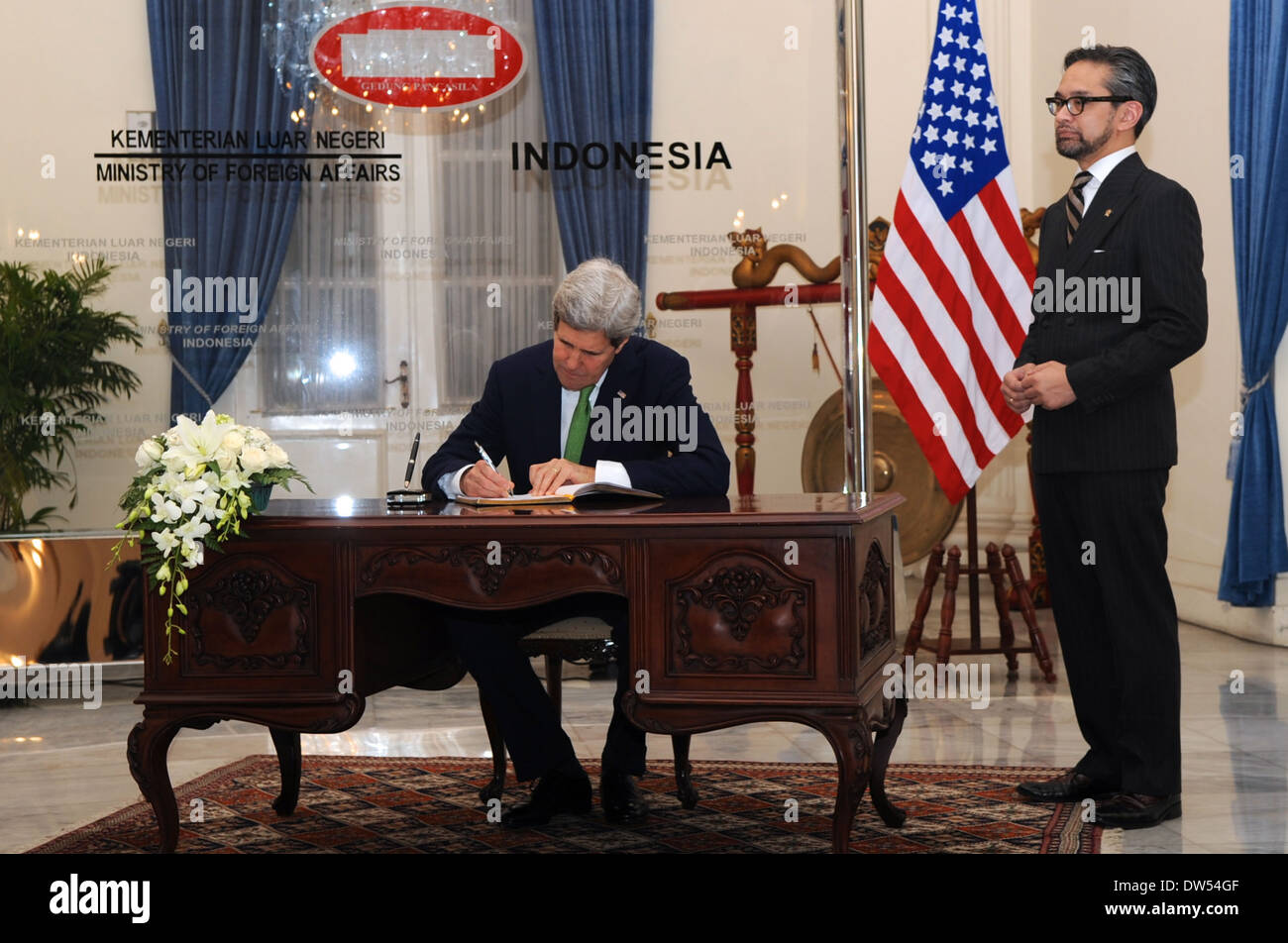 Secretary Kerry Signs Guest Book at Indonesian Ministry of Foreign Affairs Stock Photo