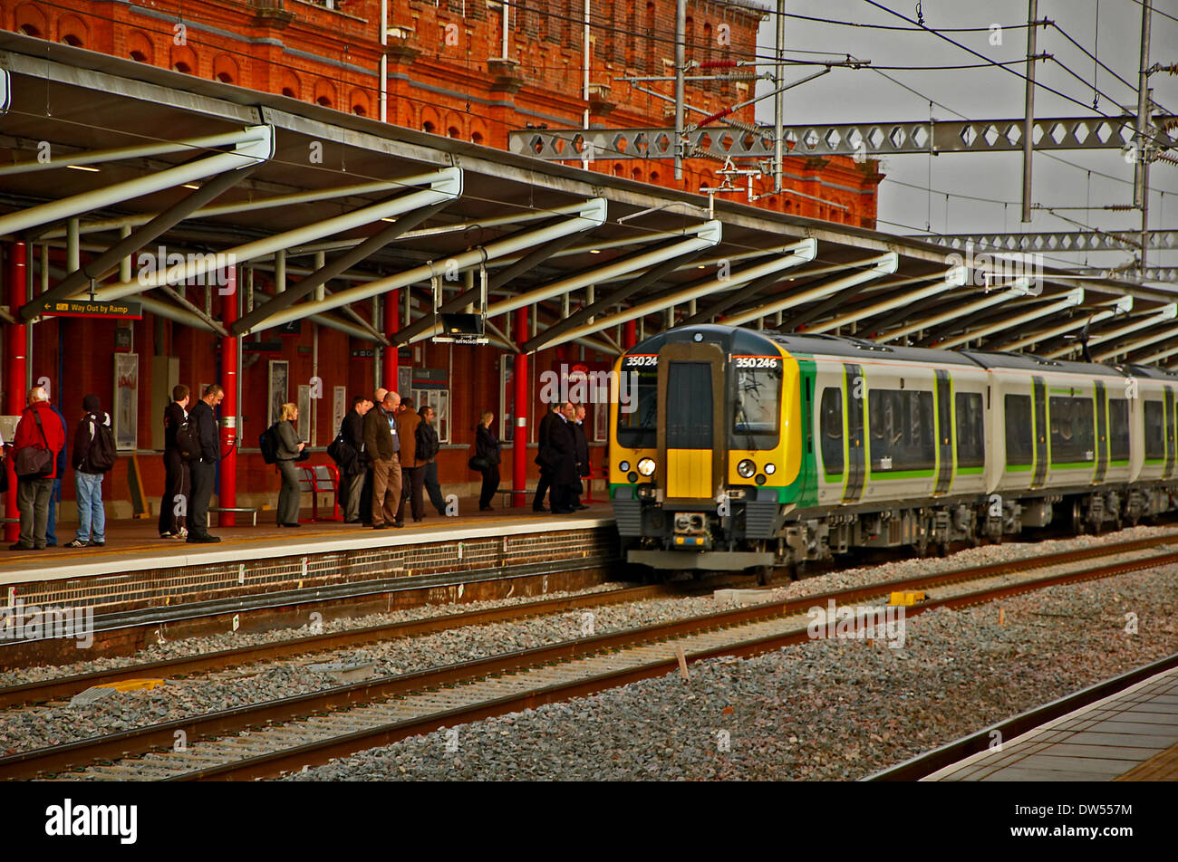 Passenger train waiting in a station platform Stock Photo