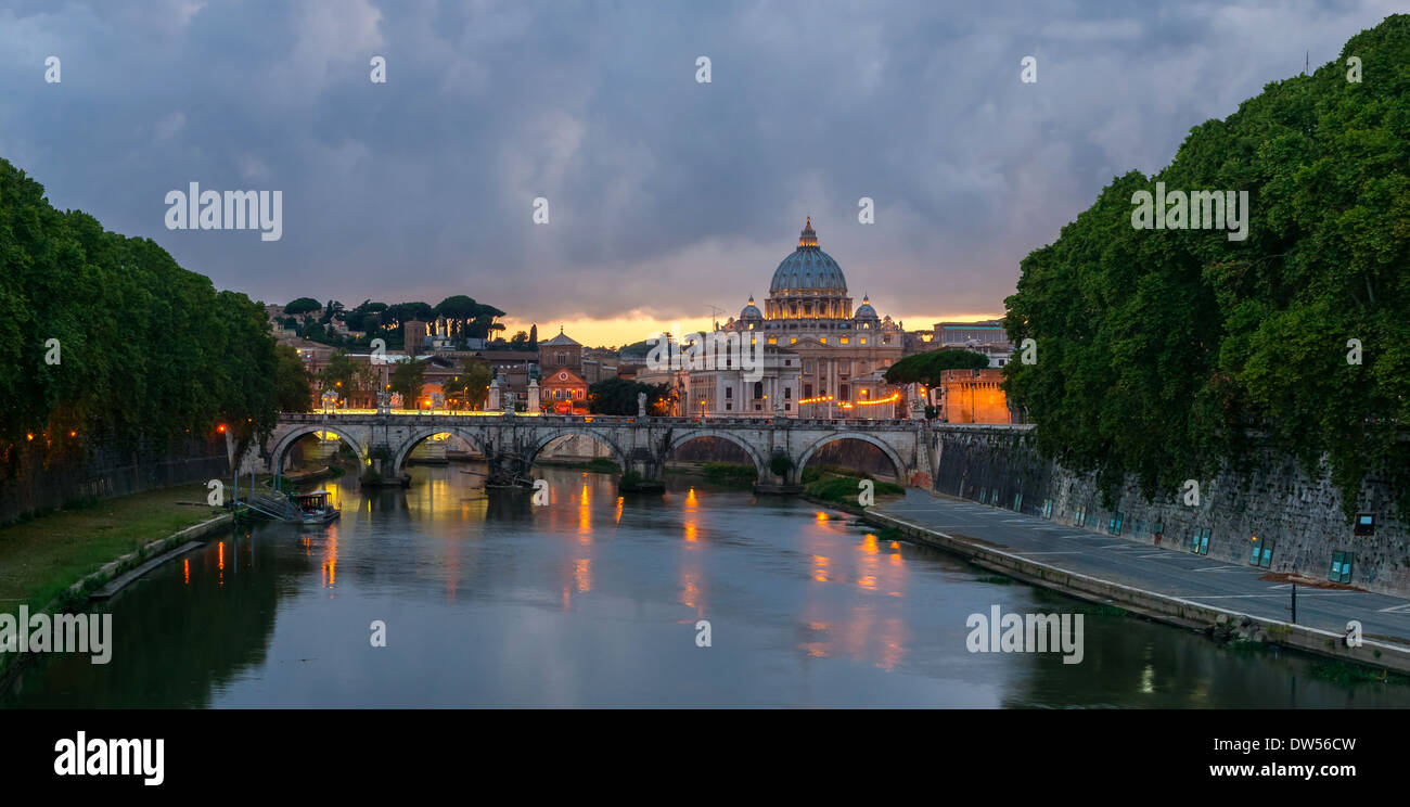 Sant'Angelo bridge (Ponte Sant'Angelo), Saint Peter's Basilica, at dusk, from Umberto I bridge, Rome, Italy. Stock Photo
