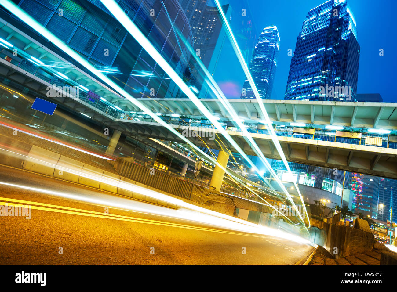 Abstract light trails yellow and blue hi-res stock photography and ...