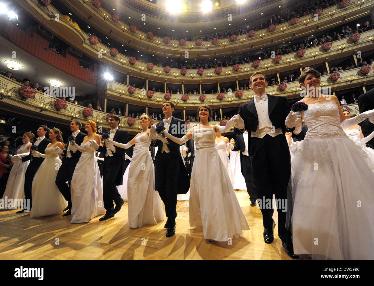 Vienna, Austria. 27th Feb, 2014. Young people in splendid attire dance during the ball at Vienna
