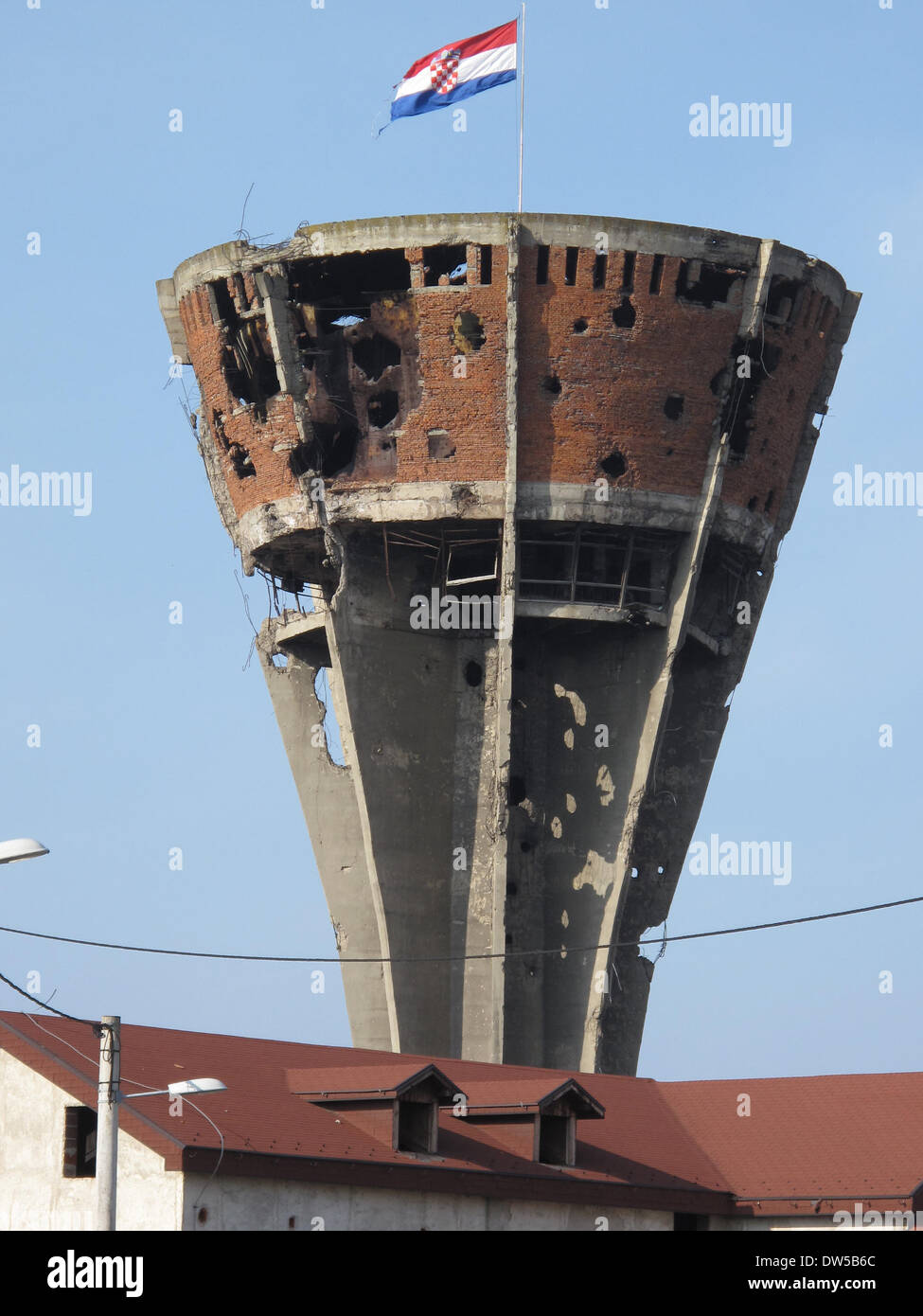 Vukovar, Croatia. 25th Feb, 2014. The water tower, destroyed in the war and preserved as a monument, in Vukovar, Croatia, 25 February 2014. 22 years ago, the city received international attention as the 'Croatian Stalingrad' as the conflict between the Croatian majority and Serbian minority flared up. Photo: Thomas Brey/dpa/Alamy Live News Stock Photo