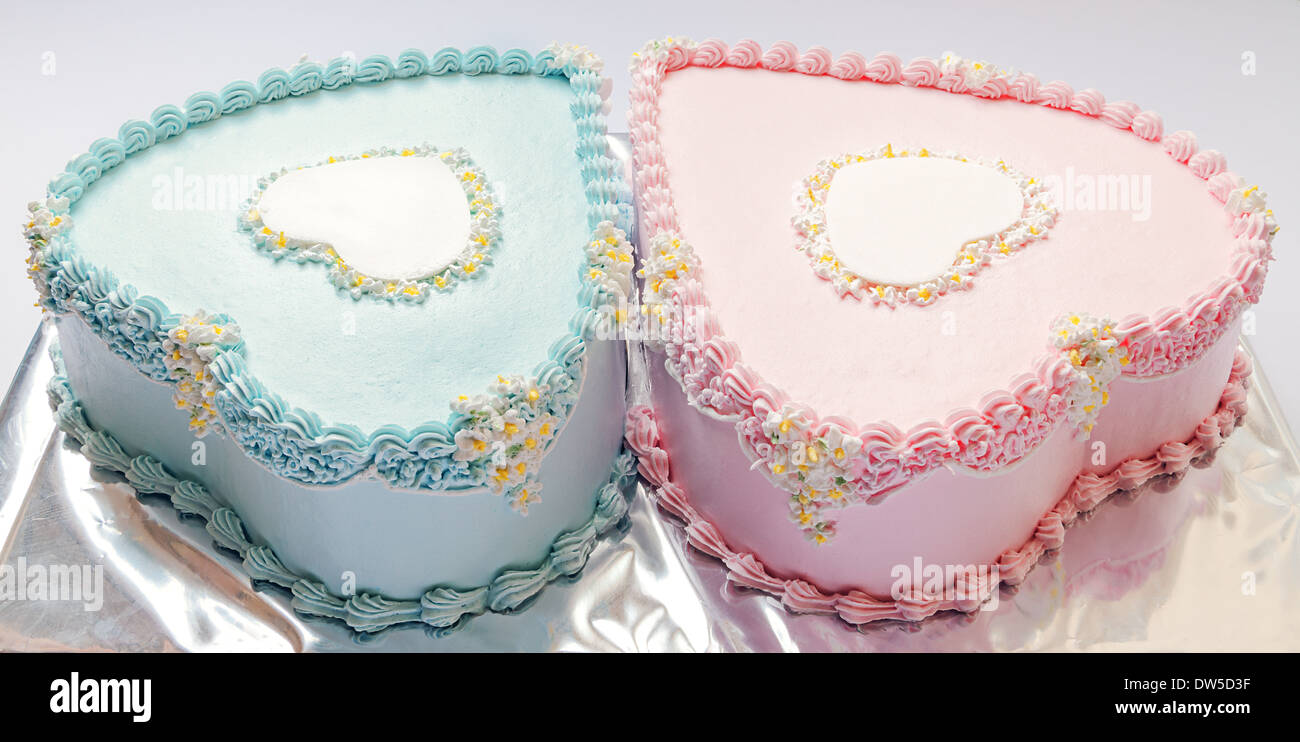 Birthday Cakes For Twins For A Boy And A Girl Shape Of Hearts Stock Photo Alamy