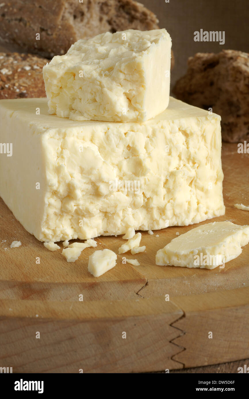 Cheshire a traditional dense and crumbly white British cheese one of the oldest recorded named cheeses in British history Stock Photo