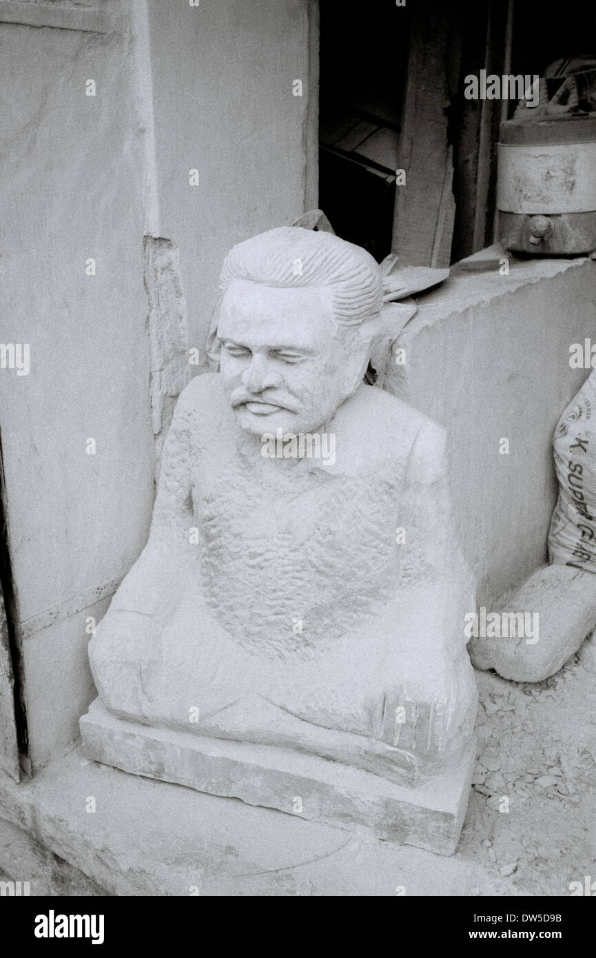 Travel Photography - Stonemason in Jaipur in Rajasthan in India in South Asia. Art Sculpture Stock Photo