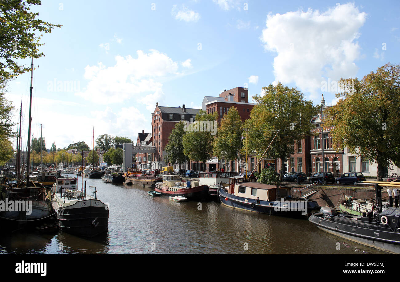 Warehouses and sailing ships along the canals at Noorderhaven (Northern Harbour) in Groningen, The Netherlands Stock Photo