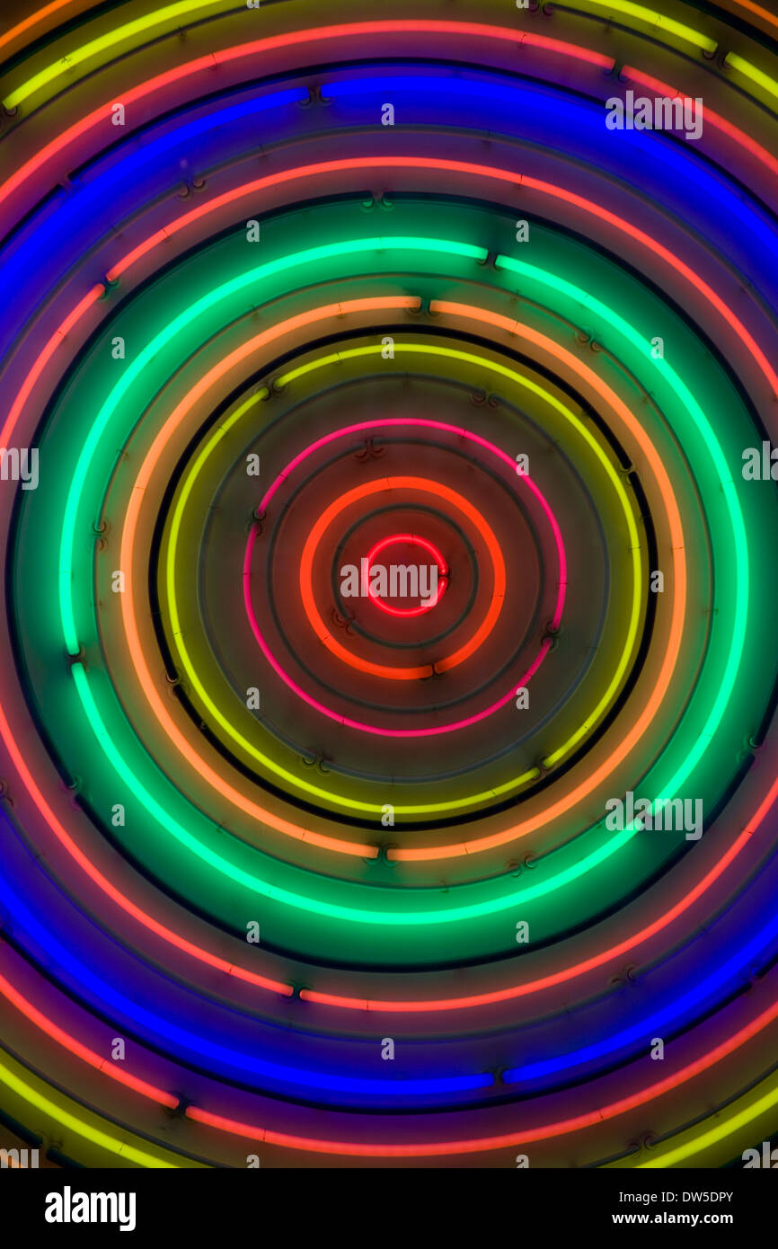 Multi coloured neon light art installation tubes in concentric circles