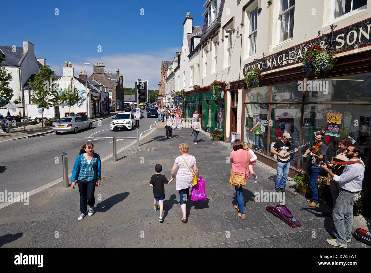 Busking in Cromwell Street, Stornoway Stock Photo