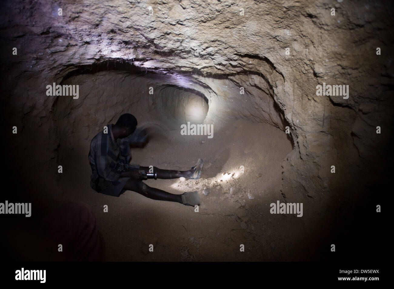 Inside a smallscale Tanzanite mine in Tanzania miners are working