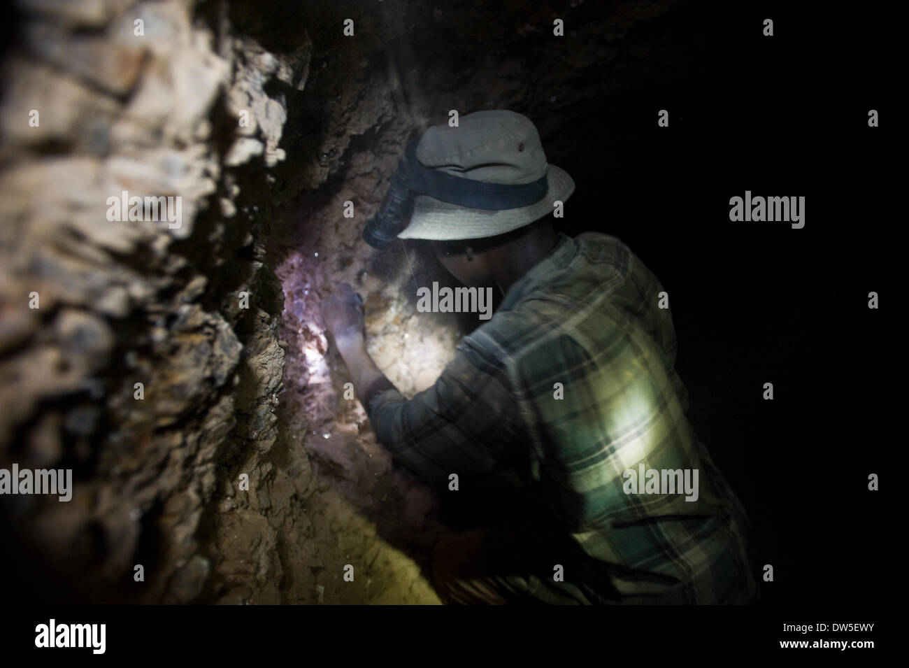 Inside a smallscale Tanzanite mine in Tanzania miners are working