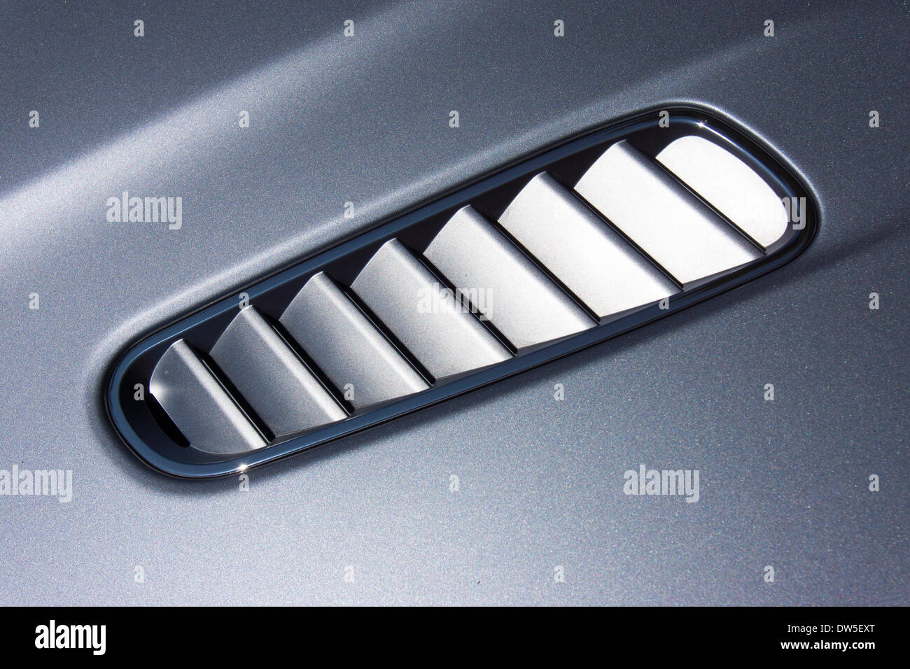 Air scoop on the hood of an Aston Martin DB9, built from 2004, Coupe, V12, since 2012 380 KW / 517 HP Stock Photo