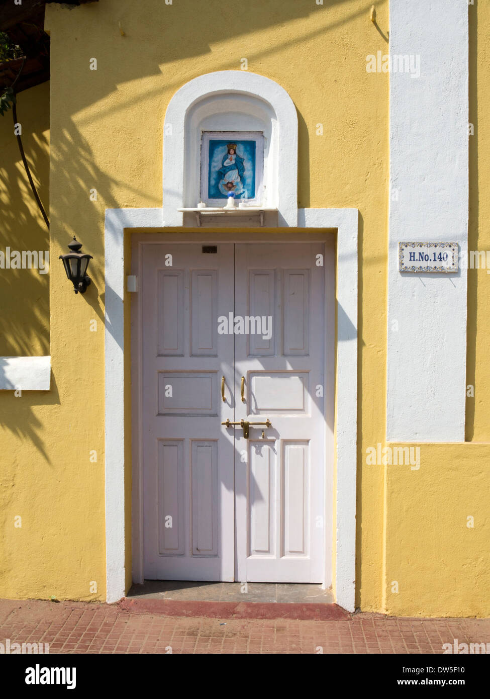 India, Goa, Panjim, Fontainhas, Rua Sao Tome, door of colourfully painted house in old Portuguese Latin Quarter Stock Photo