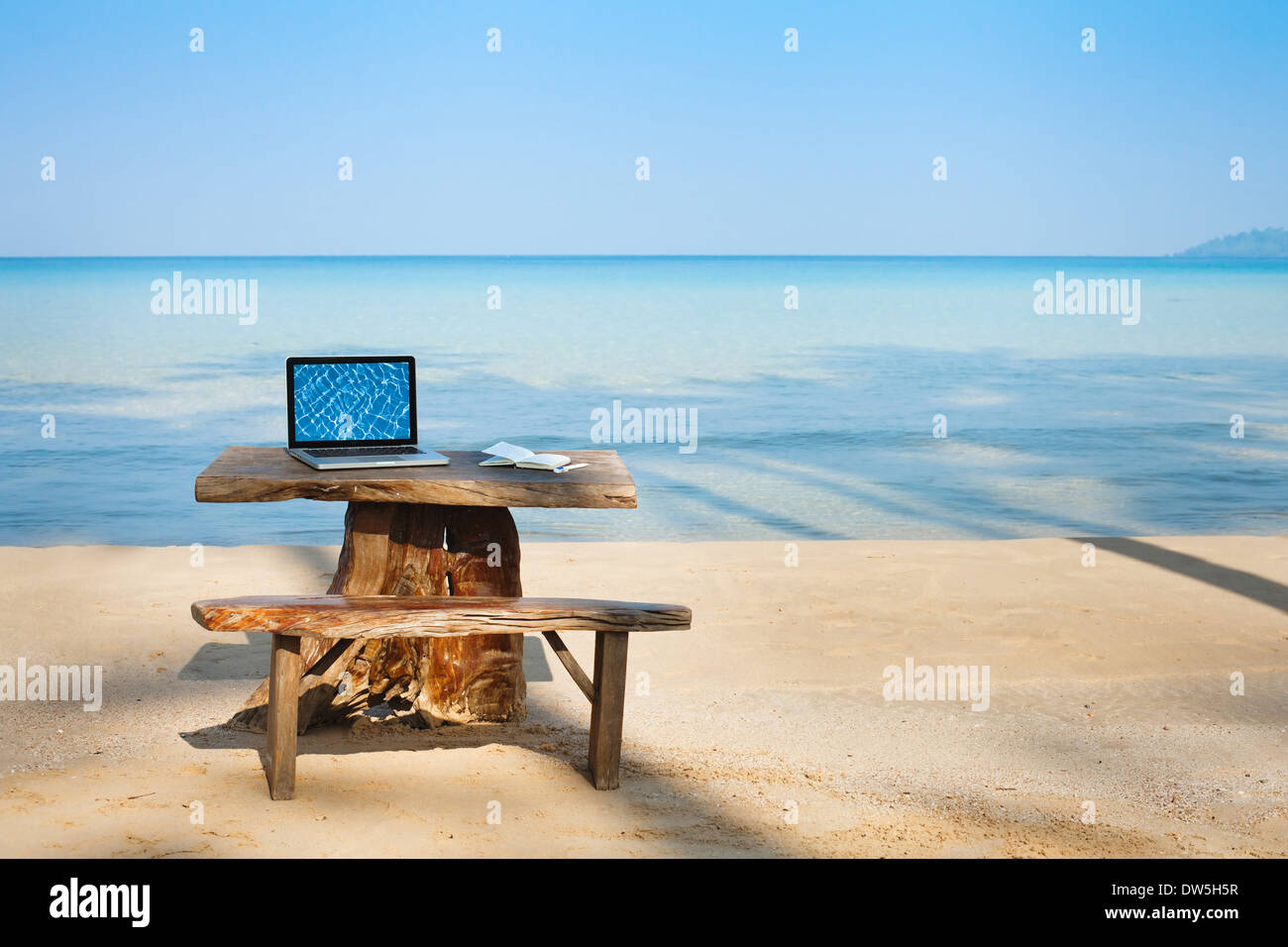 office on the beach, computer and table Stock Photo
