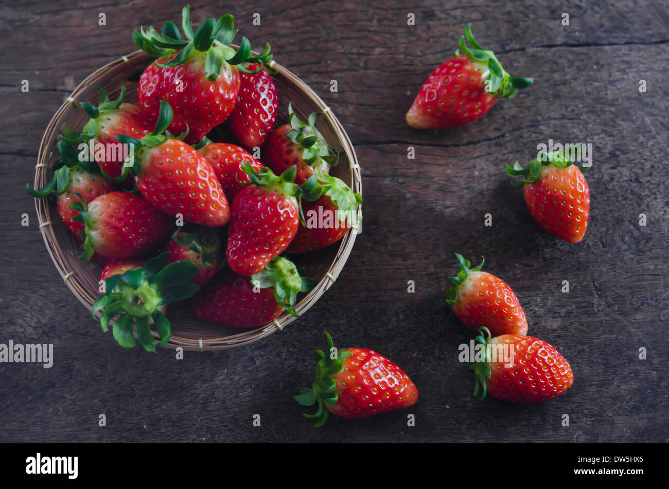 Fresh strawberries on basket , over old wooden background Stock Photo ...