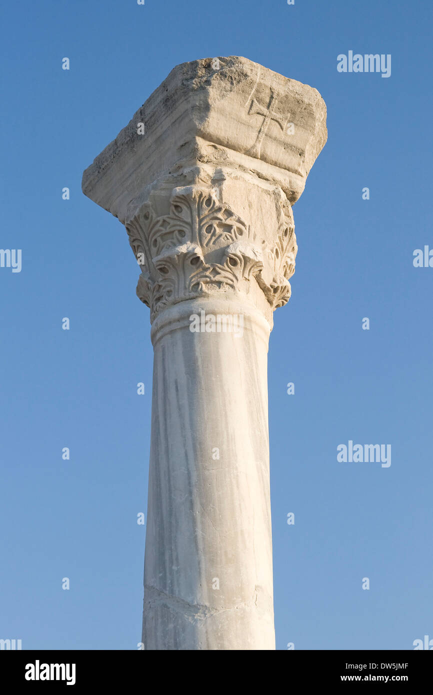 Old classical column over clear blue sky Stock Photo