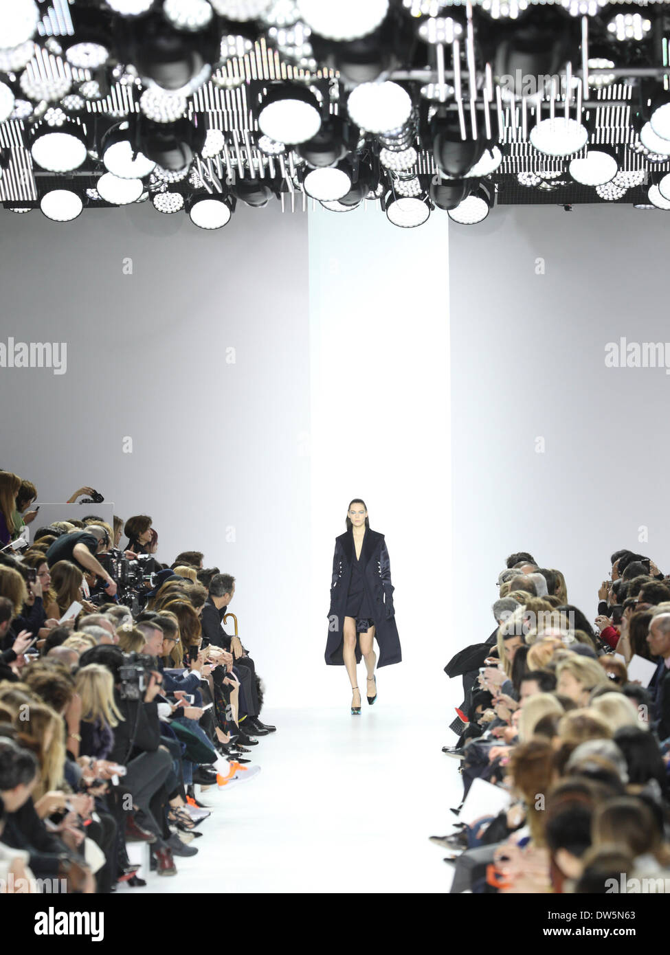 Paris, France. 28th Feb, 2014. A model wears a creation by Belgian designer Raf Simons as part of the Christian Dior fall/winter 2014 /2015 collection presented during the Paris Pret a porter fashion week, in Paris, France, 28 February 2014. Paris Pret a porter fashion shows run until 5 March 2014. Photo: Hendrik Ballhausen - NO WIRE SERVICE/dpa/Alamy Live News Stock Photo