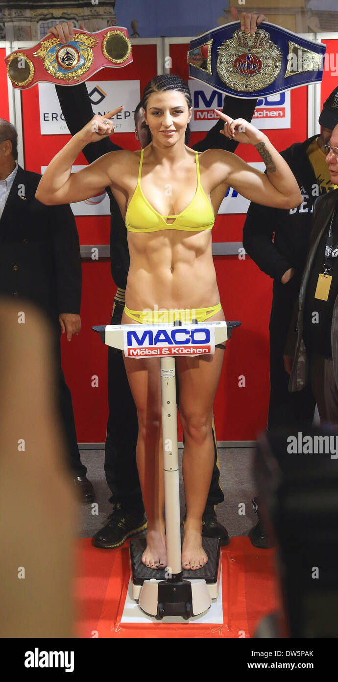 Magdeburg, Germany. 28th Feb, 2014. German boxer Christina Hammer poses  during the official weighing in Magdeburg, Germany, 28 February 2014. The  current WBO and WBF world champion is to defend her title