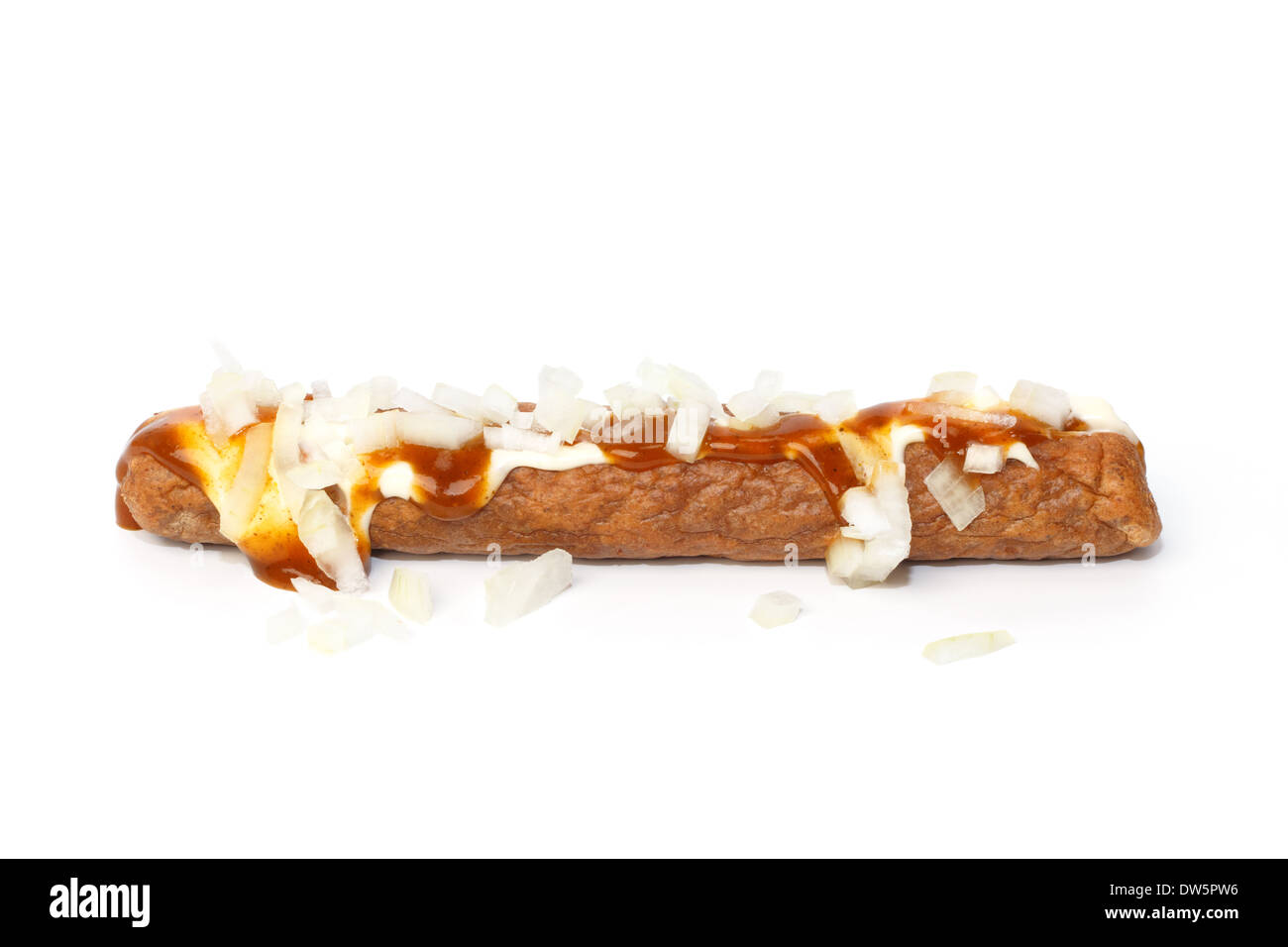Frikandel speciaal, a Dutch fast food snack, with mayonnaise, curry sauce and chopped onions Stock Photo