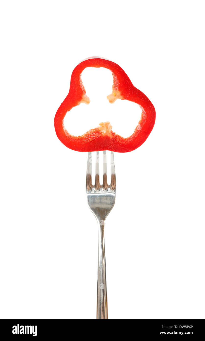 Piece of a red bell pepper pinned on a fork against white background Stock Photo