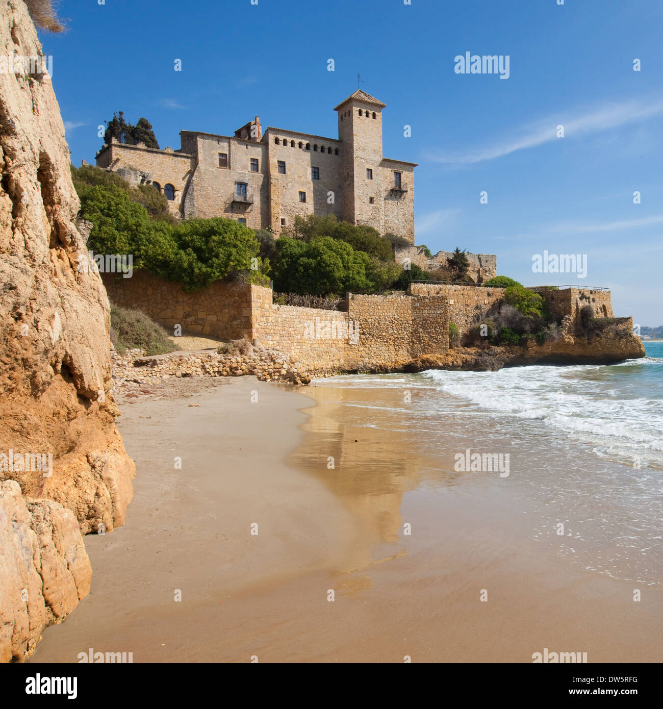 Castle of Tamarit from the beach of Cala Jovera in Tarragona, Spain. Stock Photo