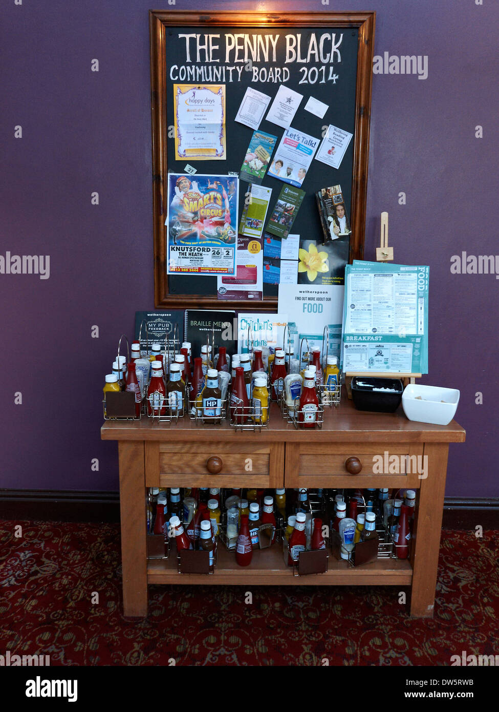 The sauces corner in The Penny Black Wetherspoon pub, Northwich Cheshire UK Stock Photo