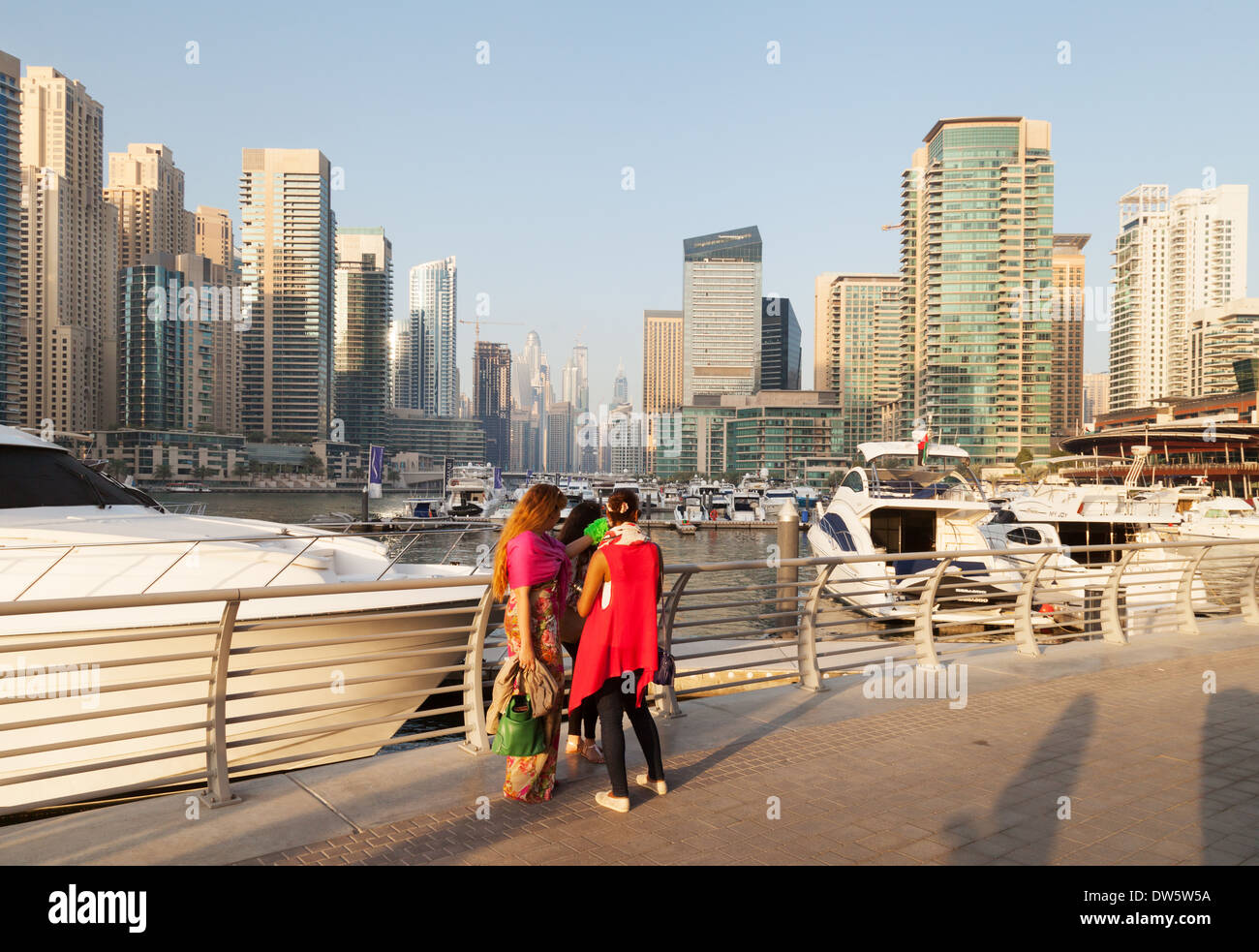 Women tourists in Dubai Marina, Dubai, UAE, united arab Emirates, Middle East Stock Photo